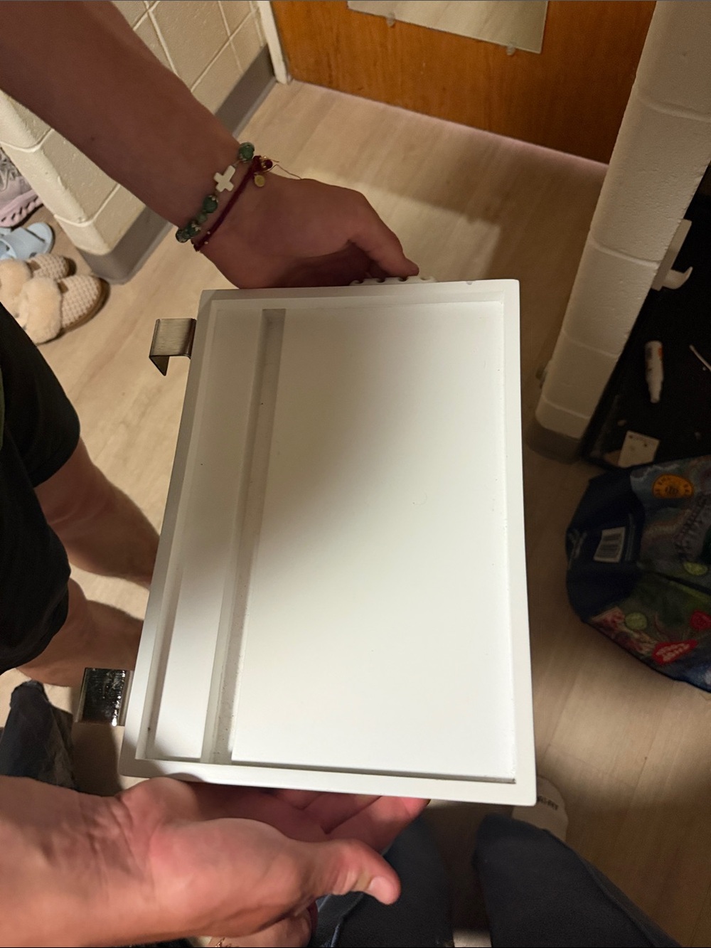Pottery Barn bedside caddy, has hook for bed rails and for extra hook underneath